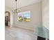 Bright dining room with hardwood floors and a view at 5060 Lake Overlook Ave, Bradenton, FL 34208