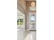 Bright and airy entryway with light wood floors at 5060 Lake Overlook Ave, Bradenton, FL 34208
