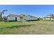 Single-story house with a two-car garage and well-manicured lawn at 5060 Lake Overlook Ave, Bradenton, FL 34208
