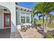 Front porch with rocking chairs and a stone patio at 5060 Lake Overlook Ave, Bradenton, FL 34208
