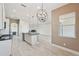 Modern kitchen with stainless steel appliances and an island at 5060 Lake Overlook Ave, Bradenton, FL 34208
