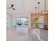 Modern kitchen with an island, pendant lights, and a view of the water at 5060 Lake Overlook Ave, Bradenton, FL 34208