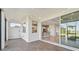Screened porch with access to kitchen and backyard at 5060 Lake Overlook Ave, Bradenton, FL 34208