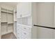 Large walk-in closet with ample shelving and drawers at 5060 Lake Overlook Ave, Bradenton, FL 34208