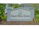 Sand Hill Cove community entrance sign at 5252 Willow Lake Ct, Sarasota, FL 34233