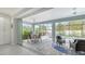 Spacious covered patio with seating and pool views at 5252 Willow Lake Ct, Sarasota, FL 34233