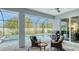 Enjoy your morning coffee by the pool on this patio at 5252 Willow Lake Ct, Sarasota, FL 34233