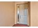 White front door with glass panel and simple design at 5306 Manorwood Dr # 2A, Sarasota, FL 34235