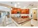 Kitchen with granite countertops and cherry wood cabinets at 5306 Manorwood Dr # 2A, Sarasota, FL 34235