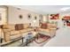 Spacious living room with two sofas and glass coffee table at 5306 Manorwood Dr # 2A, Sarasota, FL 34235