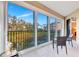 Relaxing screened balcony with scenic views and comfortable seating at 5306 Manorwood Dr # 2A, Sarasota, FL 34235