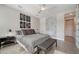 Spacious bedroom with large art pieces and built-in shelving at 5433 Hope Sound Cir, Sarasota, FL 34238