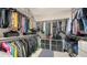 Large walk-in closet with ample hanging and shelf space at 5433 Hope Sound Cir, Sarasota, FL 34238