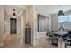 Modern home office with built-in desk and large art at 5433 Hope Sound Cir, Sarasota, FL 34238