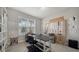 Home office with built-in shelving and large desk at 5433 Hope Sound Cir, Sarasota, FL 34238