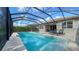 Luxury pool and spa with screened enclosure at 5433 Hope Sound Cir, Sarasota, FL 34238