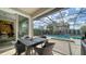 Relaxing patio area with pool and screened enclosure at 5433 Hope Sound Cir, Sarasota, FL 34238