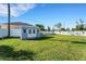Large backyard with a shed and grassy area at 585 Purdy St, Englewood, FL 34223