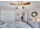 Bedroom with double door closet and access to another room at 585 Purdy St, Englewood, FL 34223