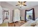 Bedroom with hardwood floors, a built-in cabinet, and a daybed at 585 Purdy St, Englewood, FL 34223