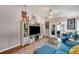 Living room with built-in entertainment center and comfortable seating at 585 Purdy St, Englewood, FL 34223