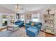 Relaxing sunroom with two comfy sofas and access to the backyard at 585 Purdy St, Englewood, FL 34223
