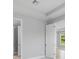 Modern bathroom with glass-enclosed shower and walk-in closet at 6005 Mesa Gln, Bradenton, FL 34203