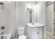 The bathroom features a vanity sink with a large mirror and neutral paint at 6005 Mesa Gln, Bradenton, FL 34203