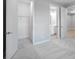 A closet with wire shelving is seen in this bedroom with gray walls at 6005 Mesa Gln, Bradenton, FL 34203