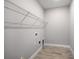 This closet has a wire shelving system and hardwood-style floors at 6005 Mesa Gln, Bradenton, FL 34203