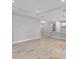 This is an open concept living area with recessed lights and views of the kitchen at 6005 Mesa Gln, Bradenton, FL 34203