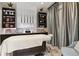 Relaxing spa room featuring a massage table, soft lighting, and elegant decor, perfect for unwinding at 6005 Mesa Gln, Bradenton, FL 34203