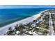 Expansive beachfront view with houses and road at 6061 Gulf Of Mexico Dr, Longboat Key, FL 34228