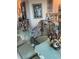 Elegant dining room featuring a glass-top table with seating and decorative art pieces at 6061 Gulf Of Mexico Dr, Longboat Key, FL 34228