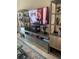 Contemporary living room showcasing a modern entertainment center with shelving at 6061 Gulf Of Mexico Dr, Longboat Key, FL 34228