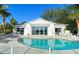 A stunning outdoor area with a crystal-clear pool and comfortable seating, perfect for relaxation and enjoying the view at 6061 Gulf Of Mexico Dr, Longboat Key, FL 34228