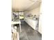 Community laundry room with multiple washers and dryers for resident use at 6064 Arlene Way, Bradenton, FL 34207