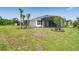 Large grassy backyard area, perfect for outdoor activities at 6107 Mesa Gln, Bradenton, FL 34203