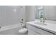 Bathroom featuring a shower-tub combination with white tiles and vanity at 6107 Mesa Gln, Bradenton, FL 34203