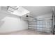 Spacious garage with automatic door and ample room for parking and storage at 6107 Mesa Gln, Bradenton, FL 34203