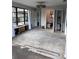 Unfinished bathroom with exposed walls and new flooring at 6504 Lincoln Rd, Bradenton, FL 34203