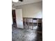 Unfinished bedroom with exposed walls and new flooring at 6504 Lincoln Rd, Bradenton, FL 34203
