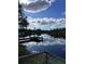 Scenic waterfront property with a private dock and tranquil water views at 6504 Lincoln Rd, Bradenton, FL 34203