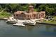 Stunning waterfront mansion boasting a terracotta roof and bay views at 730 40Th St, Sarasota, FL 34234