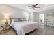 Comfortable bedroom with a ceiling fan, neutral colors, and modern furnishings at 730 40Th St, Sarasota, FL 34234