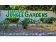 Sign for Sarasota Jungle Gardens with lush greenery and landscaping at 730 40Th St, Sarasota, FL 34234