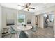 Bright dining area featuring a modern table and chairs, creating a cozy space for meals and gatherings at 730 40Th St, Sarasota, FL 34234
