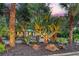 A beautiful home with exterior lighting and lush landscaping providing ample curb appeal at 730 40Th St, Sarasota, FL 34234