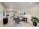 Stylish living room and dining area with modern decor, comfortable seating, and abundant natural light at 730 40Th St, Sarasota, FL 34234