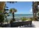 Scenic waterfront view of the bay with a bench overlooking the water at 730 40Th St, Sarasota, FL 34234